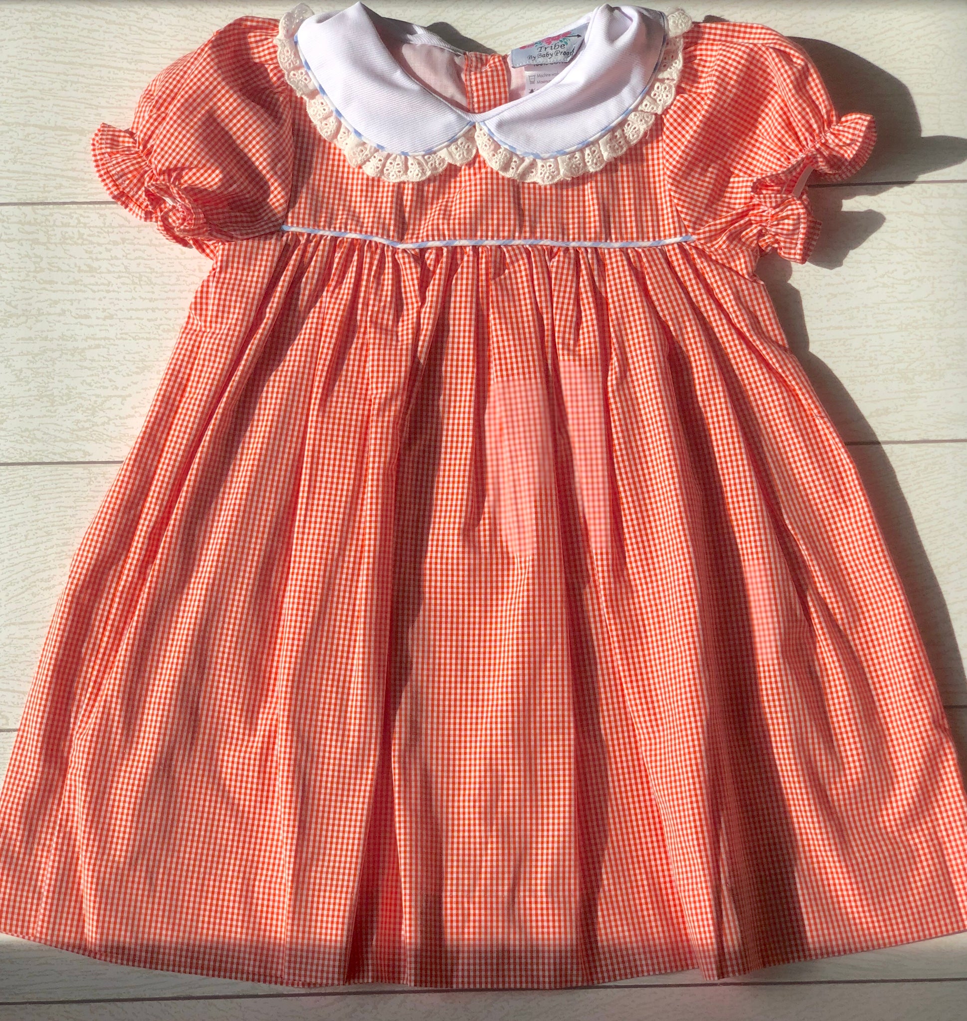 Orange gingham dress The Little Tribe Orange gingham dress The Little Tribe