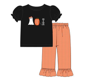 Black knit Halloween shirt with gingham pants